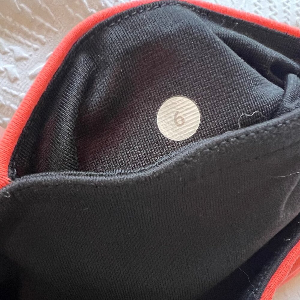 Women's Lululemon Reversible Black, Coral Leggings Size 6 Used/Fair Condition - Picture 4 of 7